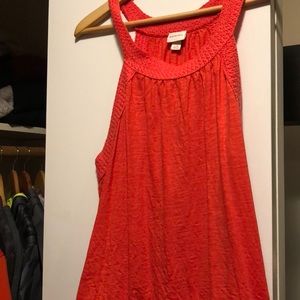 Orange asymmetrical bottom tank